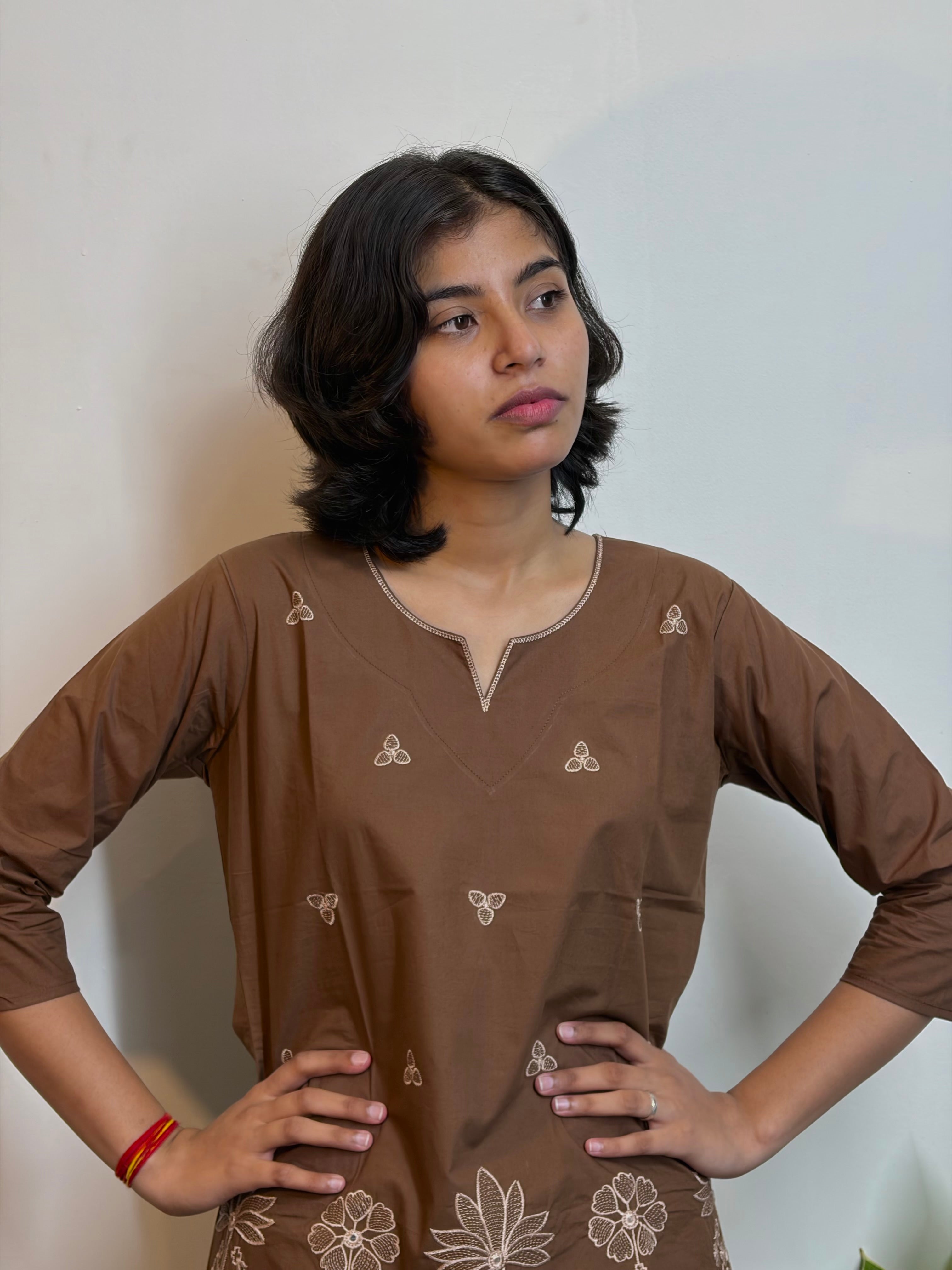 Rich Brown Cotton Kurti Adorned With White Thread Embroidery